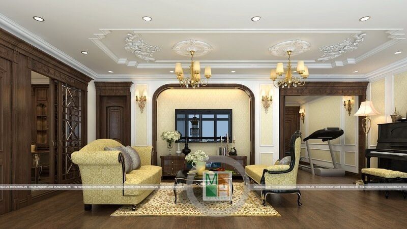 Thiết kế nội thất chung cư Mandarin tân cổ điển sang trọng với tông màu vàng ánh kim chủ đạo trên nền sàn ốp gỗ màu nâu trầm làm nổi bật không gian căn phòng.